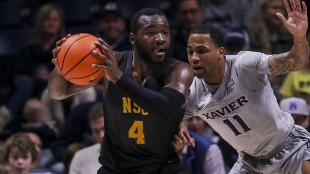 Nov 21, 2021; Cincinnati, Ohio, USA; Norfolk State Spartans guard Joe Bryant Jr. (4) dribbles against Xavier Musketeers guard Dwon Odom (11) in the first half at Cintas Center. Mandatory Credit: Katie Stratman-USA TODAY Sports